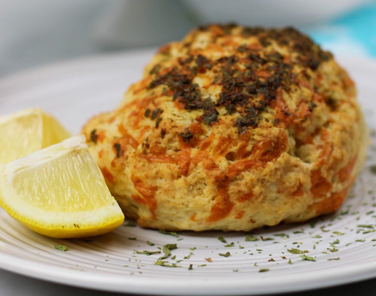 Crab Stuffed Cheddar Bay Biscuits with Lemon Butter Sauce