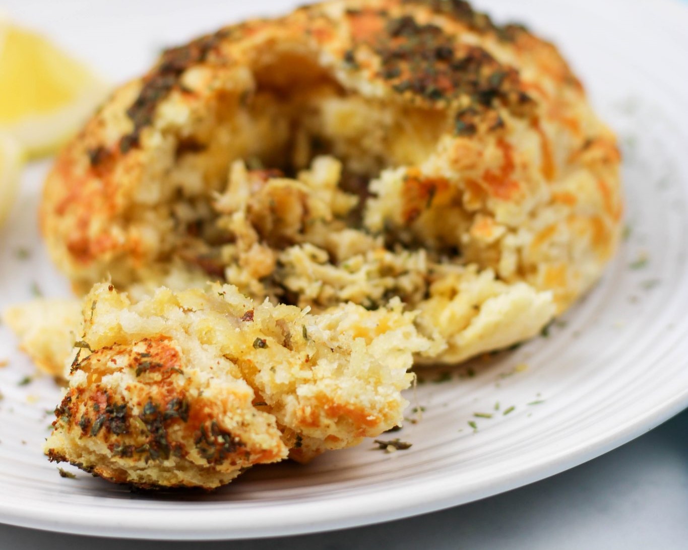 Crab Stuffed Cheddar Bay Biscuits with Lemon Butter Sauce