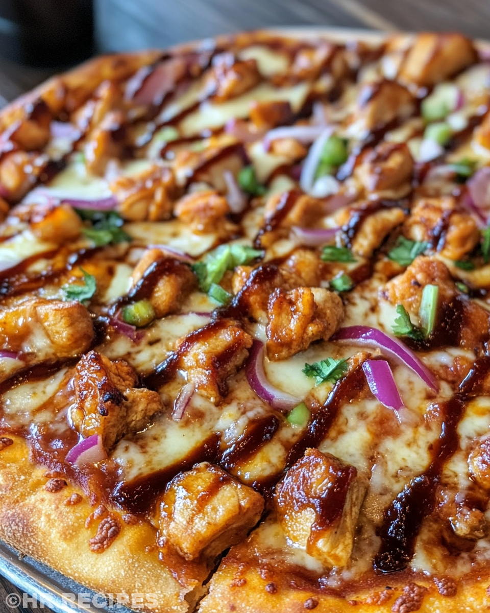 Ingredients laid out for BBQ chicken pizza including dough, cheeses, chicken, and veggies