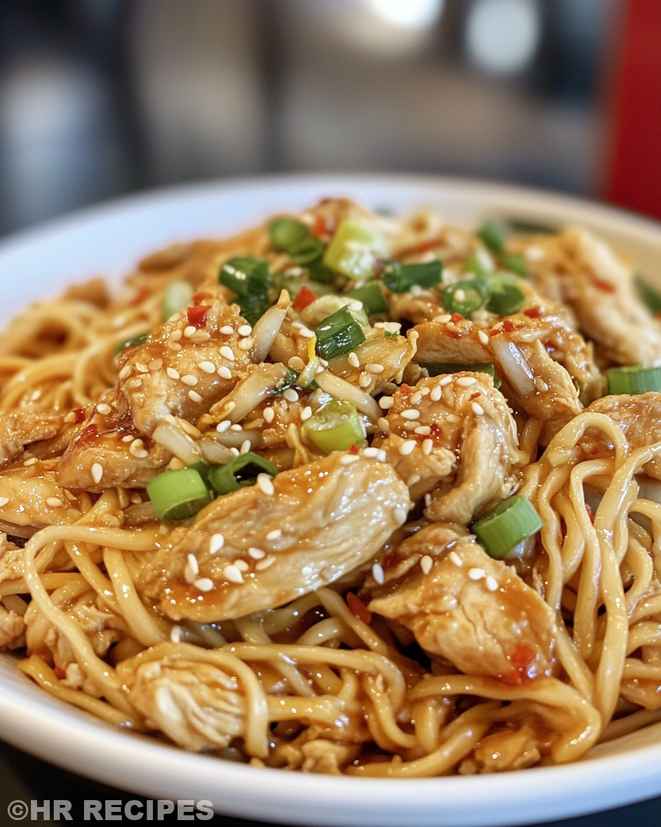 Ingredients for chicken chow mein neatly prepared in bowls