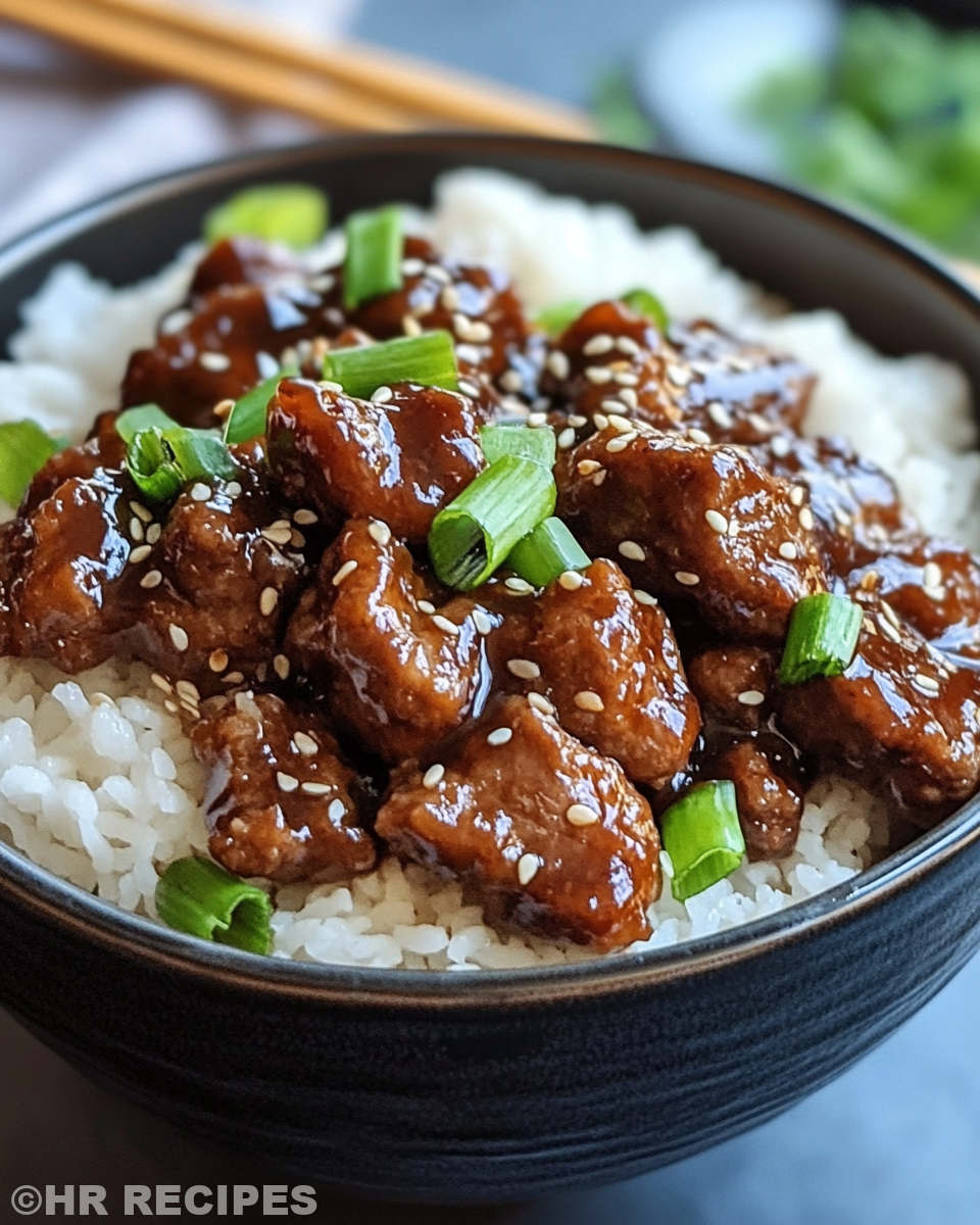 Final served Crock Pot General Tso's Chicken meal with rice and broccoli