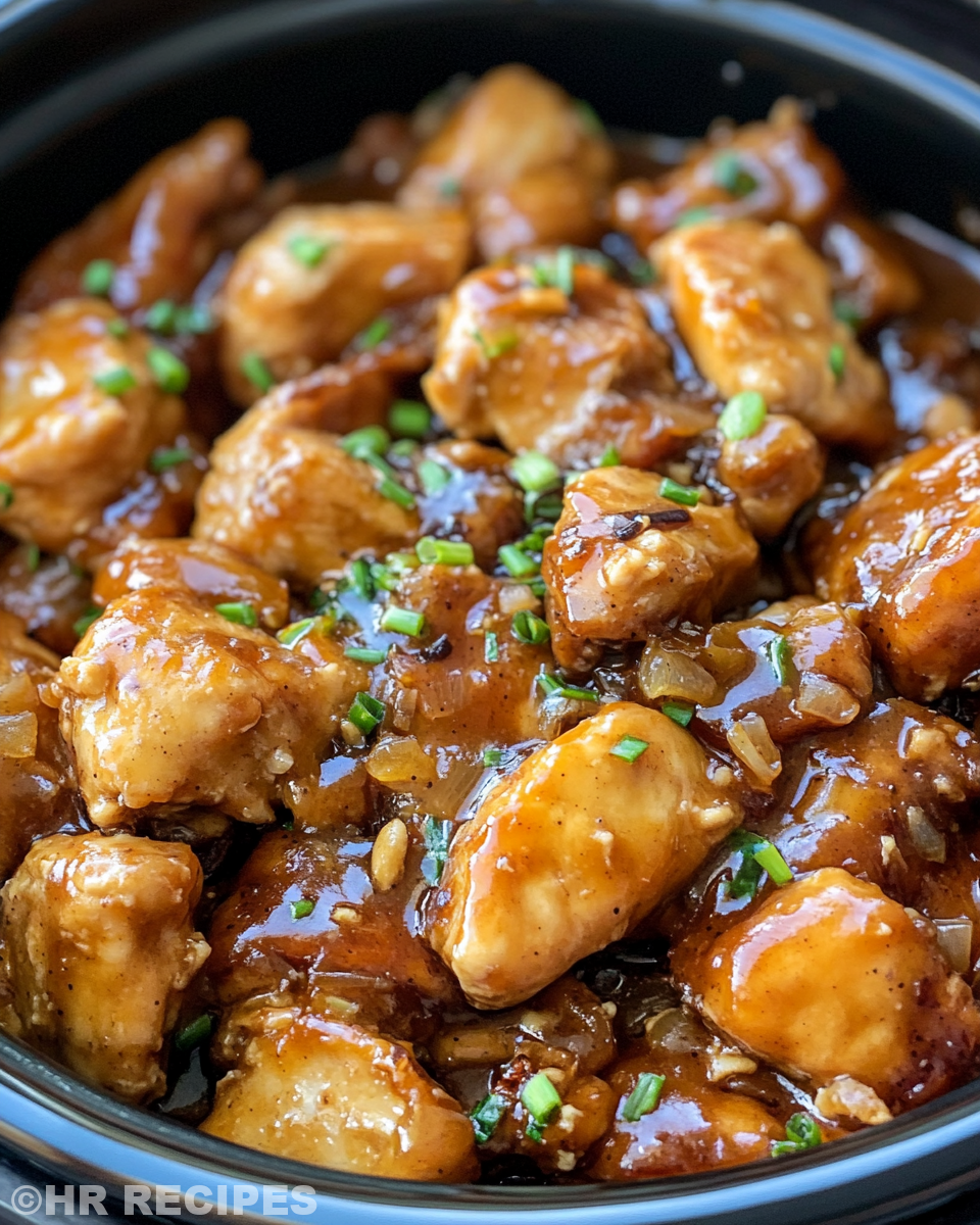 Slow cooker Hawaiian sticky chicken beginning to cook with steam
