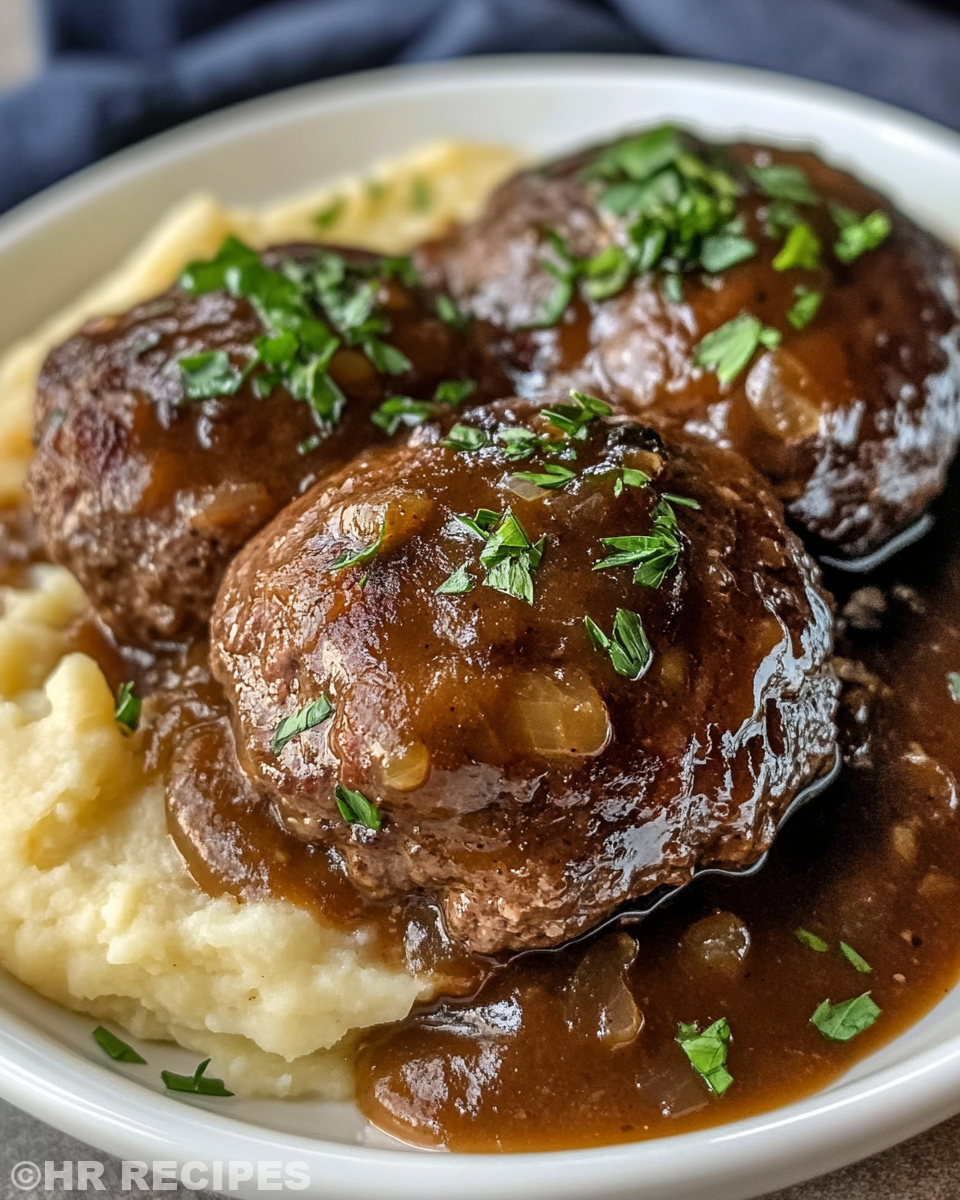 Ingredients for Salisbury steak laid out including mushrooms, onions, ground beef and gravy mix